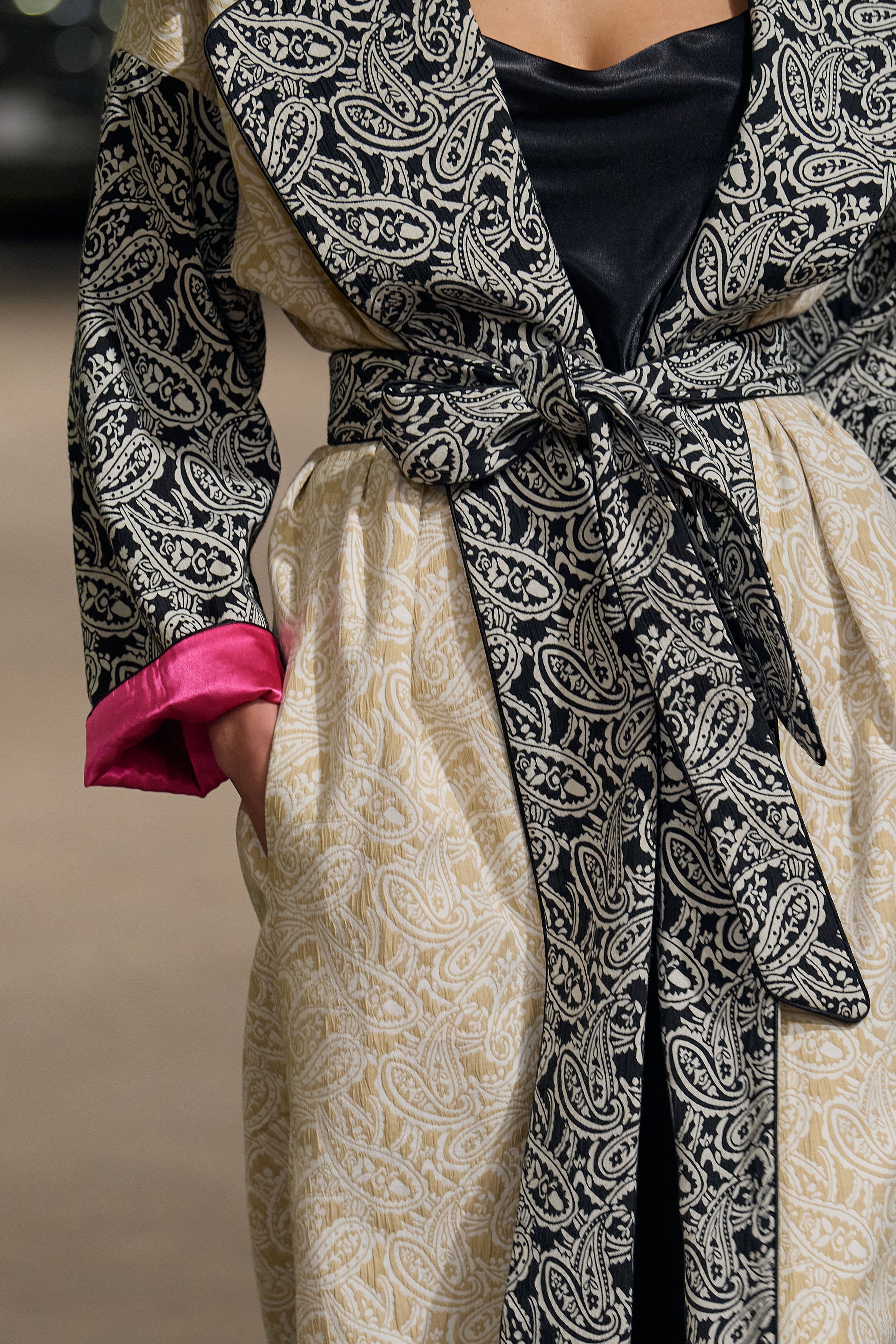 coat with belt and pink ends